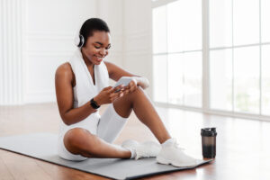 woman listening to music while exercising