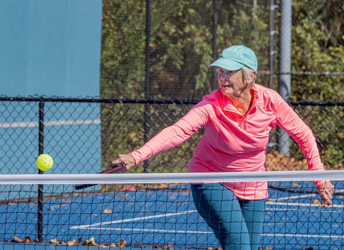 woman playing pickleball