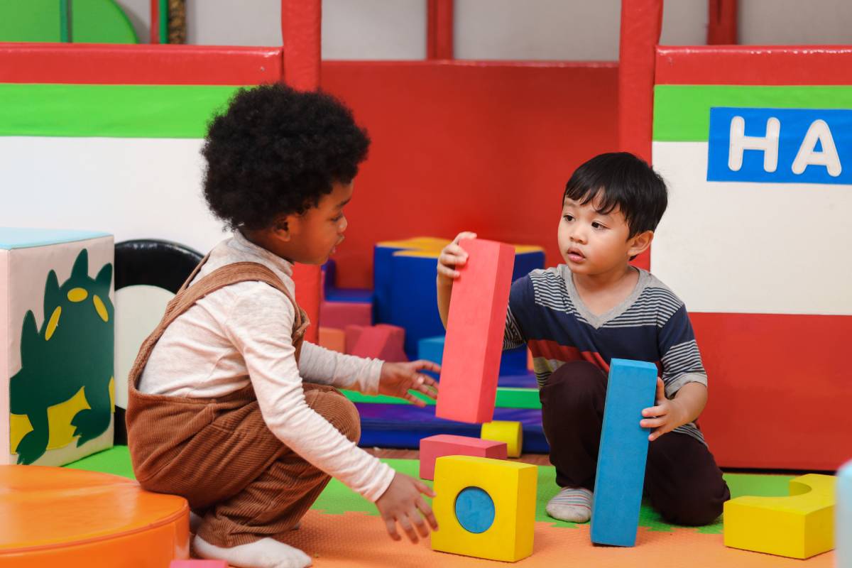 Two children playing together at daycare